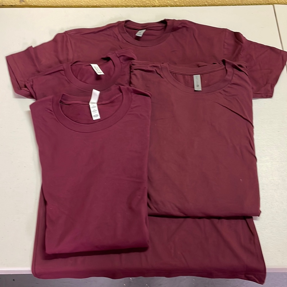 Multiple maroon blank tshirts